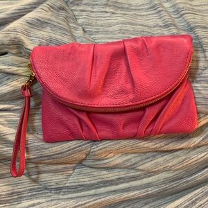 Baker’s hot pink clutch